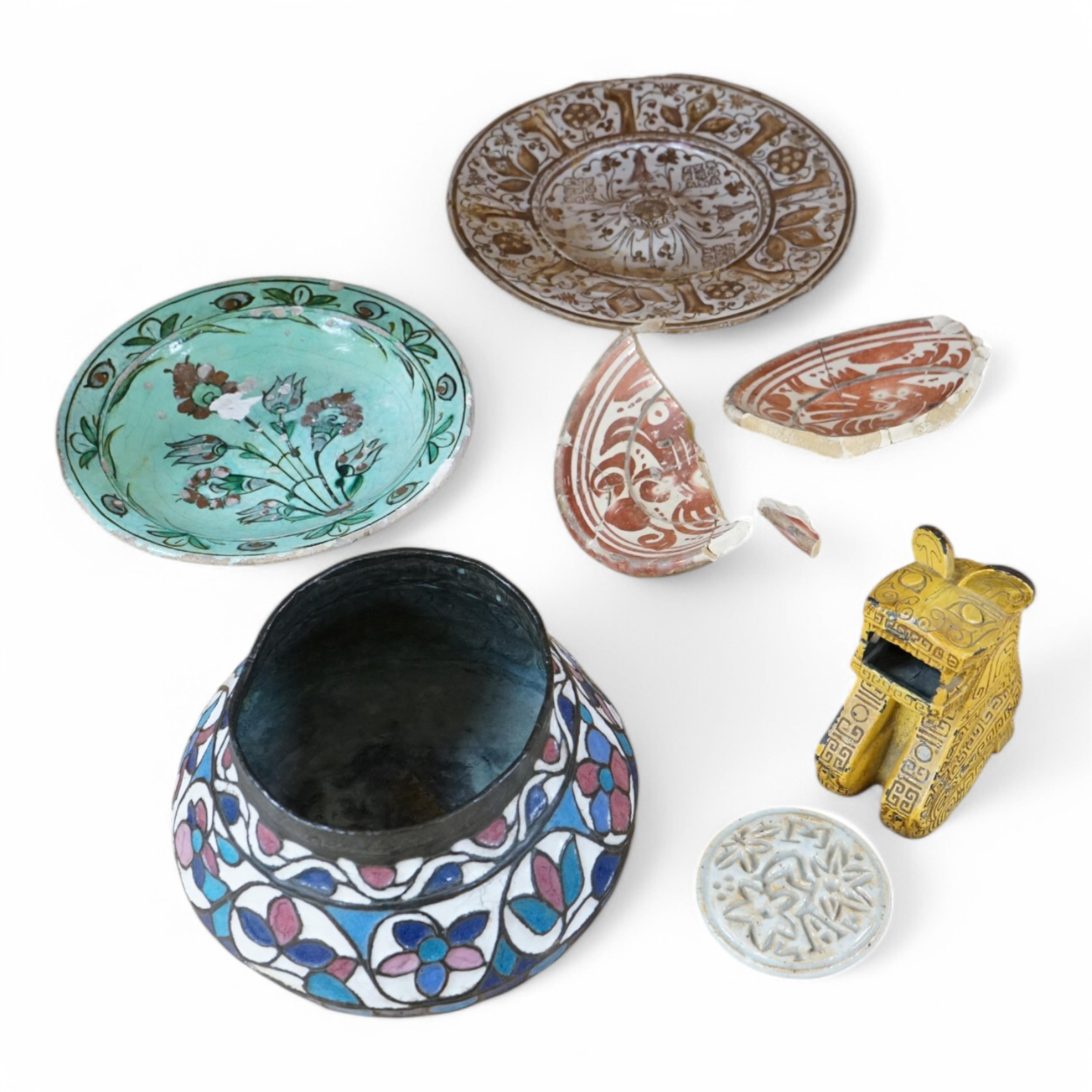 A 16th / 17th century Hispano Moresque copper lustre dish, together with other ceramics, largest 26cm in diameter. Condition - varies